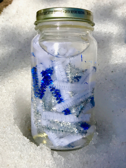 TheInspiredHome.org // DIY Sensory Bottles: Winter. A variety of winter-themed sensory bottles for your baby or toddler to explore snowflakes, snow and more! A quick & simple dollar store craft.
