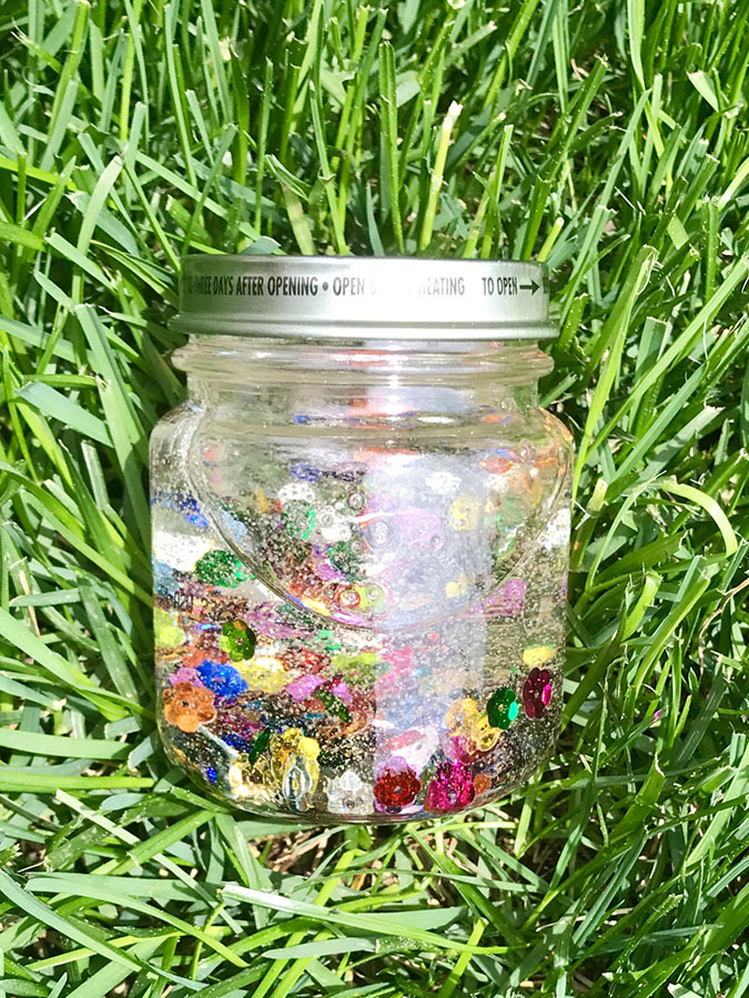 TheInspiredHome.org // Create some beautiful spring-themed sensory bottles to teach your kids about the wonders of flowers and insects. Another great dollar store craft!
