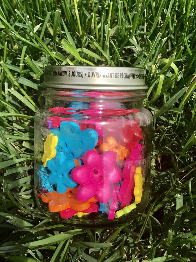 TheInspiredHome.org // Create some beautiful spring-themed sensory bottles to teach your kids about the wonders of flowers and insects. Another great dollar store craft!